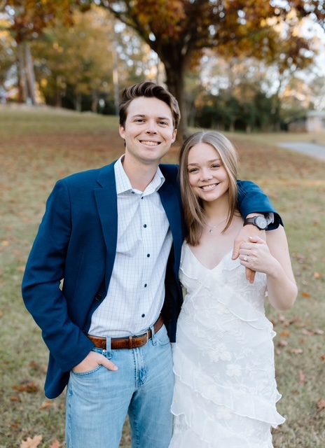 Gavin Gochnour, CFP®, smiling alongside his fiancée as they celebrate their engagement.